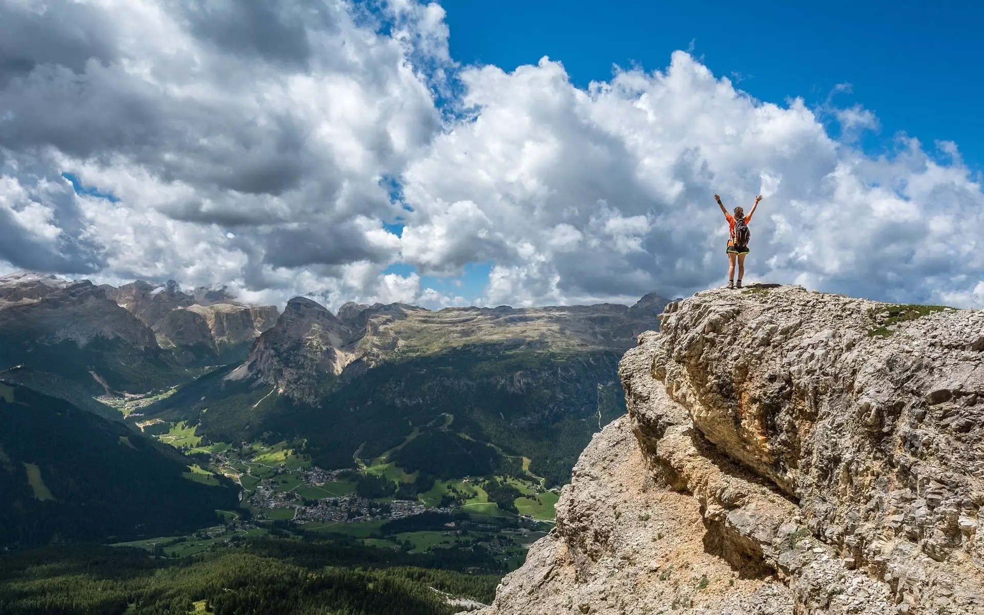 Person standing on a mountain peak